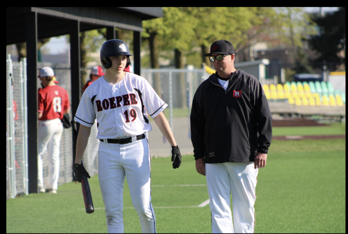 Coach Dunfield in action with one of his players at Roeper during one of their games. 